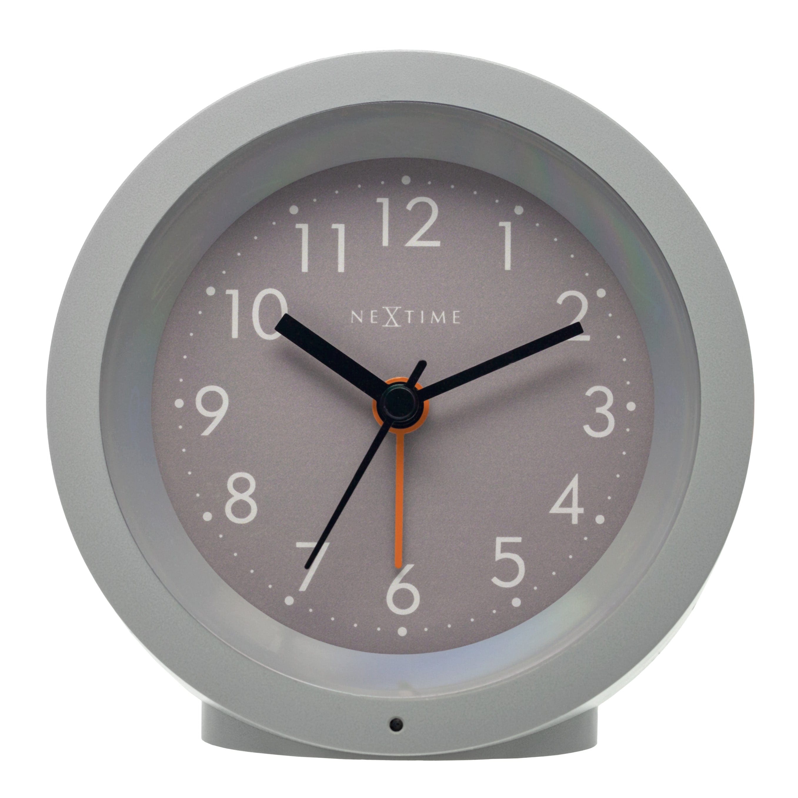 NeXtime Circle alarm clock with silent light dial, 10.5cm diameter, modern design, displayed front view.